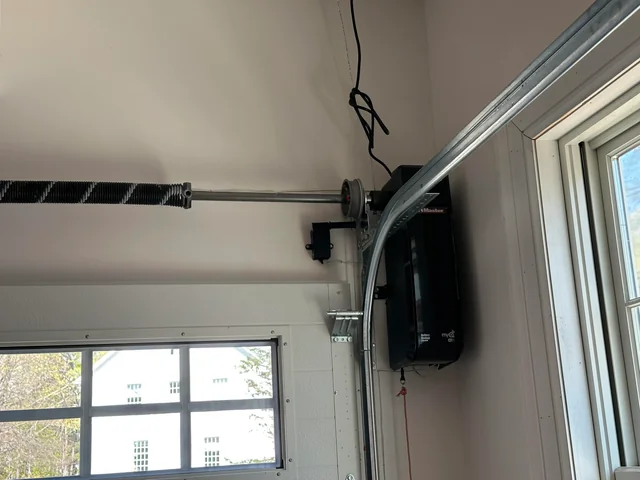 Side-mount jackshaft opener installation and alignment