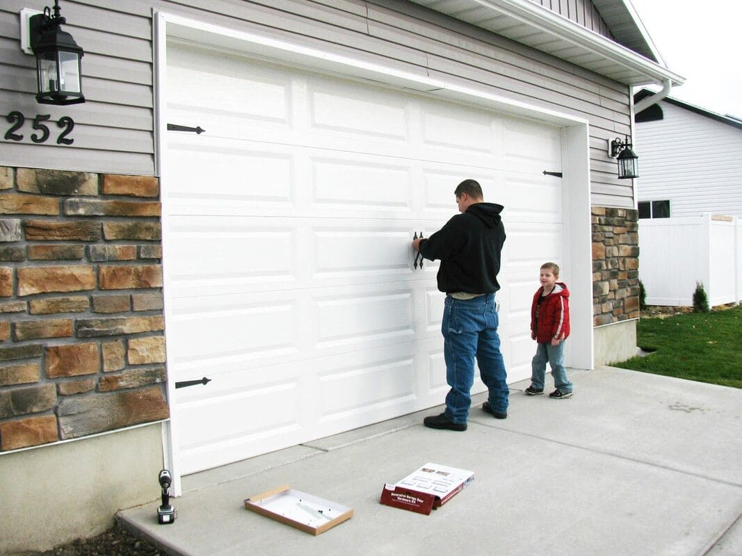 garage door replacement with Jake and his son